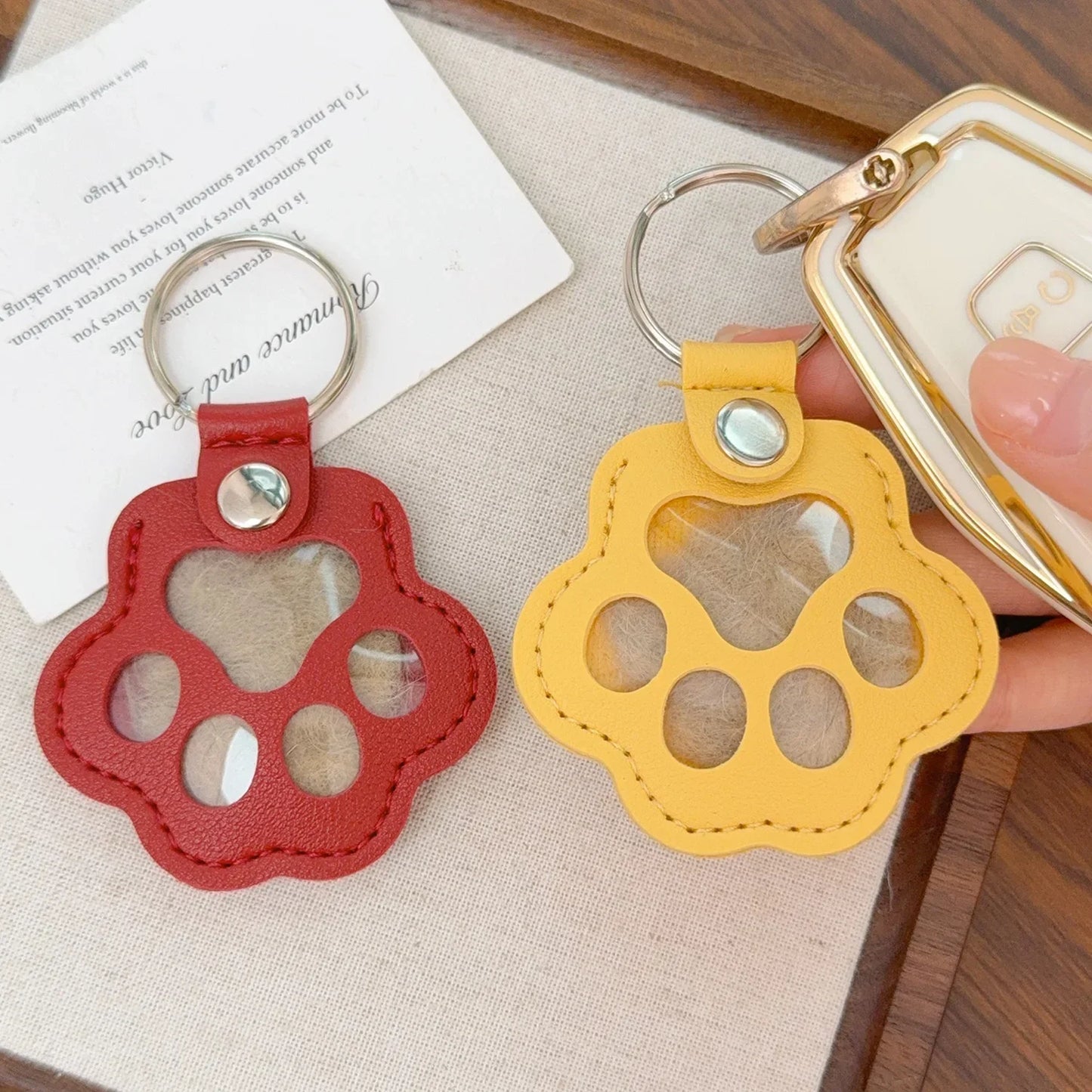 Kawaii Pet Hair Storage Paw Keychain Container
